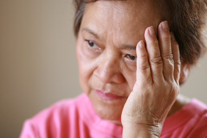 Older woman worried about the future