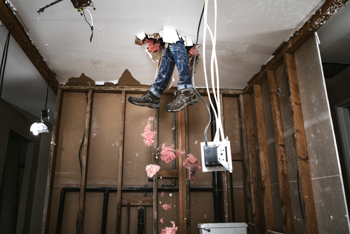 Contractor Man Doing Home Improvement and Demolition