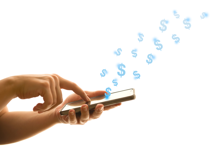 closeup of hands using a cell. phone with dollar signs floating away
