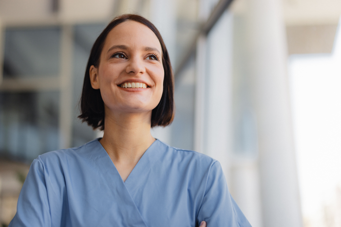 Portrait of female nurse at medical clinic
