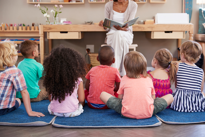 Teacher Reading To Children